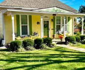The Yellow Cottage with an Inviting Hot Tub