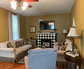 The Yellow Cottage with an Inviting Hot Tub