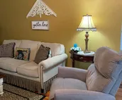 The Yellow Cottage with an Inviting Hot Tub