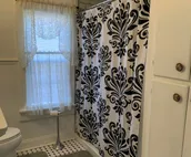 The Yellow Cottage with an Inviting Hot Tub