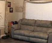 Private room with a full bed and futon.