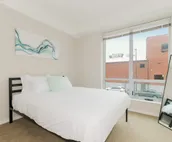 Upscale 2BR Stay with Beautiful Rooftop! 227
