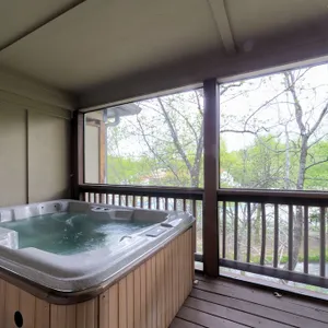 At River`s Edge On The Hooch - Amazing 3-level condo with 2 hot tubs overlooking