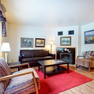 Roomy 2-story home with furnished deck, grill, fireplace, & great location