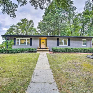 Overland Park Home w/ Deck & Waterfall Pond!