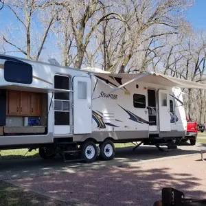 Plan a family camping trip with my travel trailer