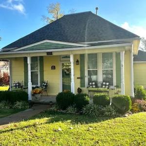 The Yellow Cottage with an Inviting Hot Tub