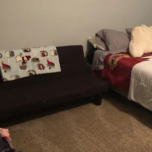 Private room with a full bed and futon.