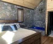 Standing Bear Studio Cabin with Hot Tub on the Deck by RedAwning