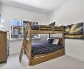 Modern home with three balconies, mountain views, and outdoor swimming pool. ...