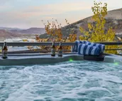Modern home with three balconies, mountain views, and outdoor swimming pool. ...