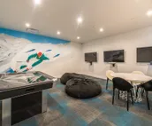 Modern home with three balconies, mountain views, and outdoor swimming pool. ...