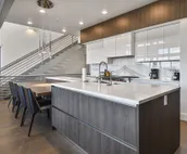 Modern home with three balconies, mountain views, and outdoor swimming pool. ...